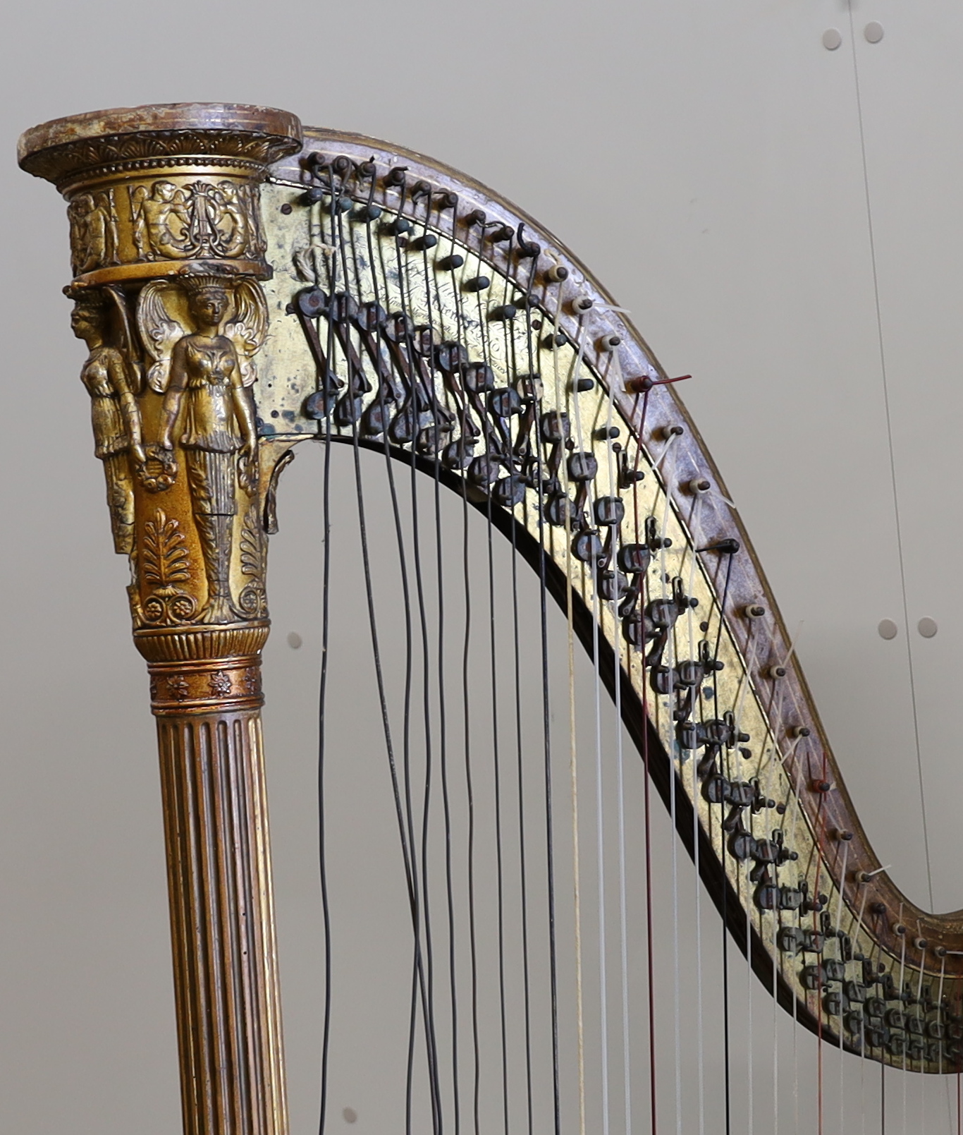 A 19th century Sebastian Erard Patent 3610 harp, in need of restoration, painted sound board, gilt fluted column and Classical capital, 170cm high